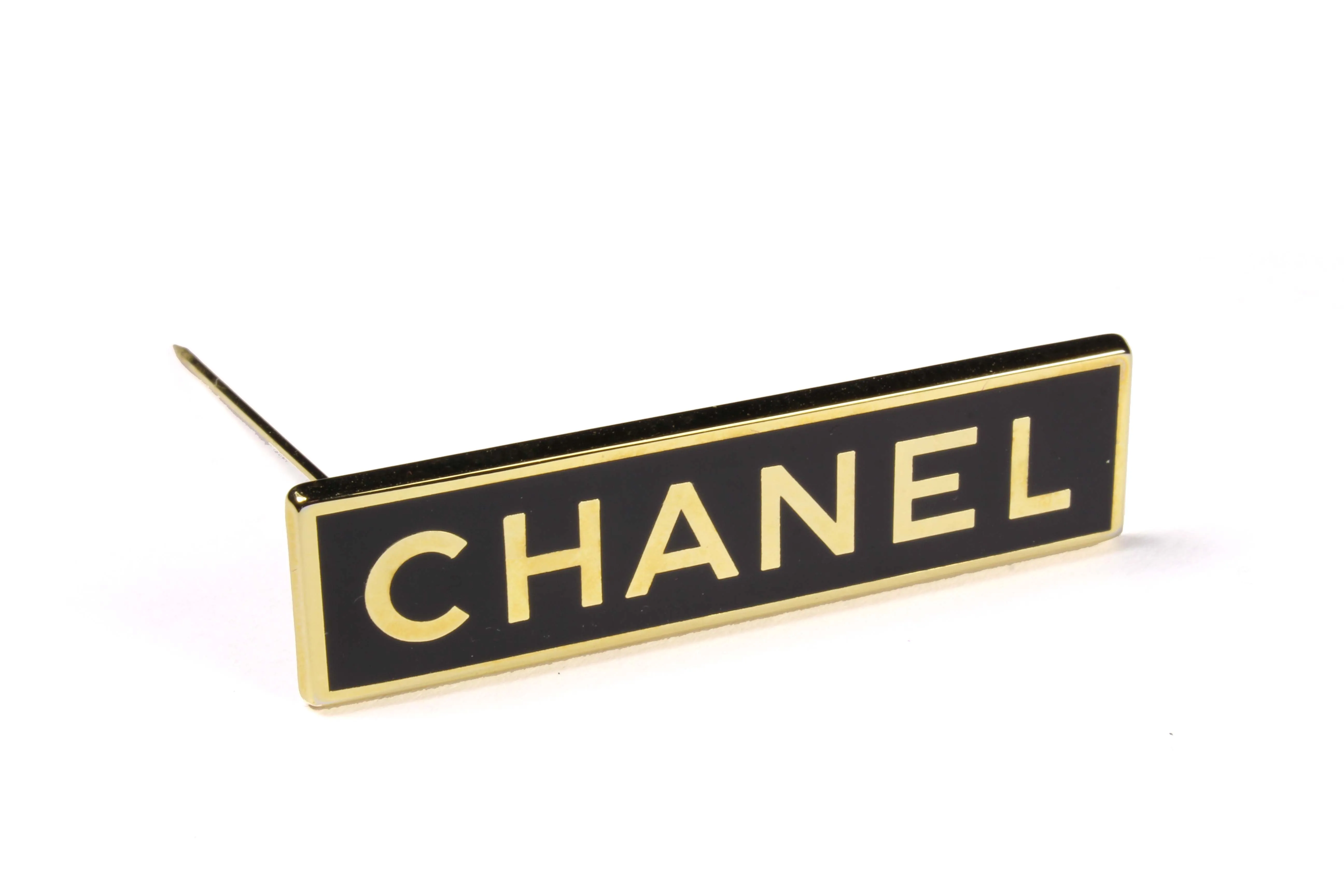 CHANEL rectangular logo brooch