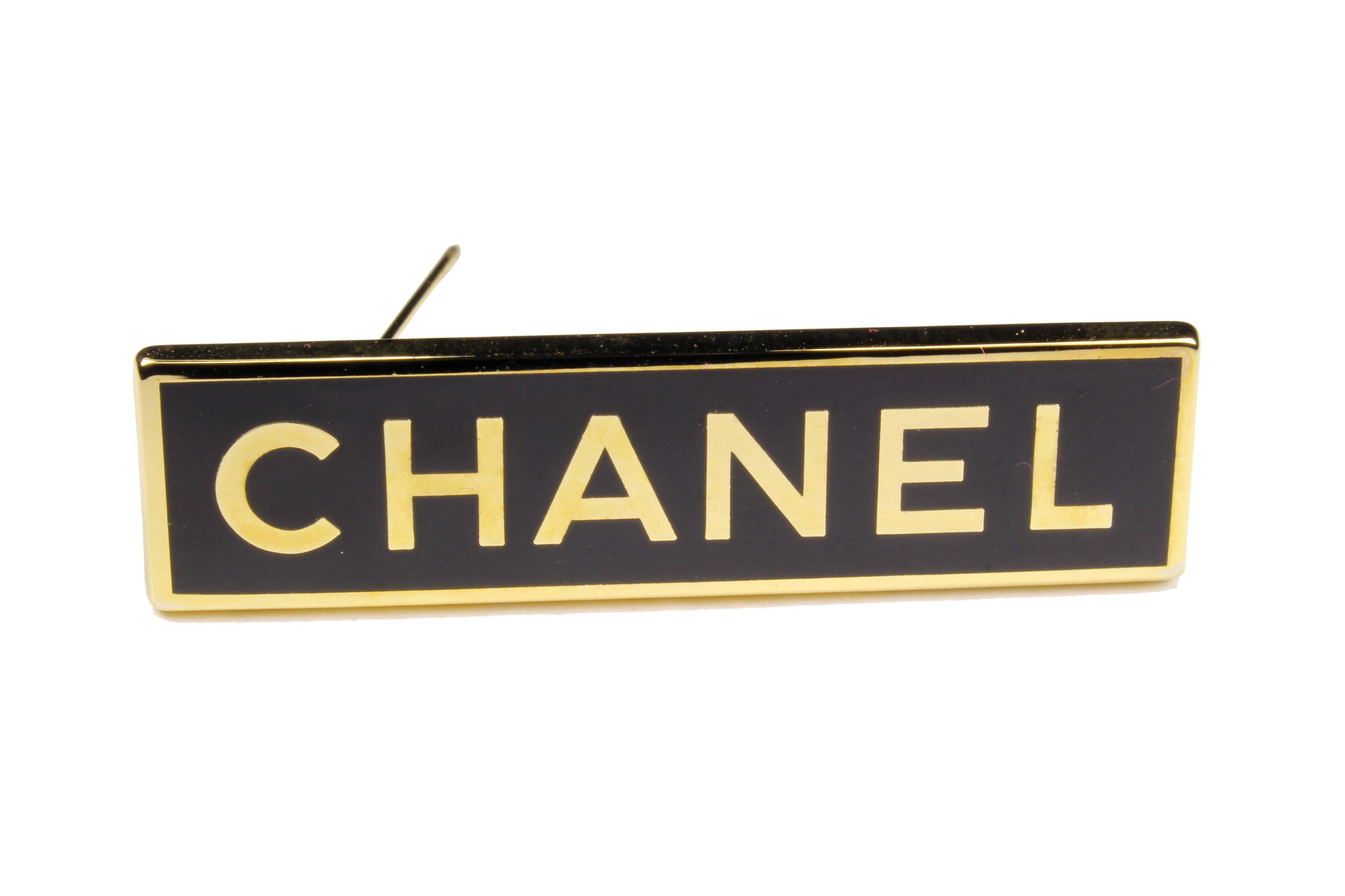 CHANEL rectangular logo brooch