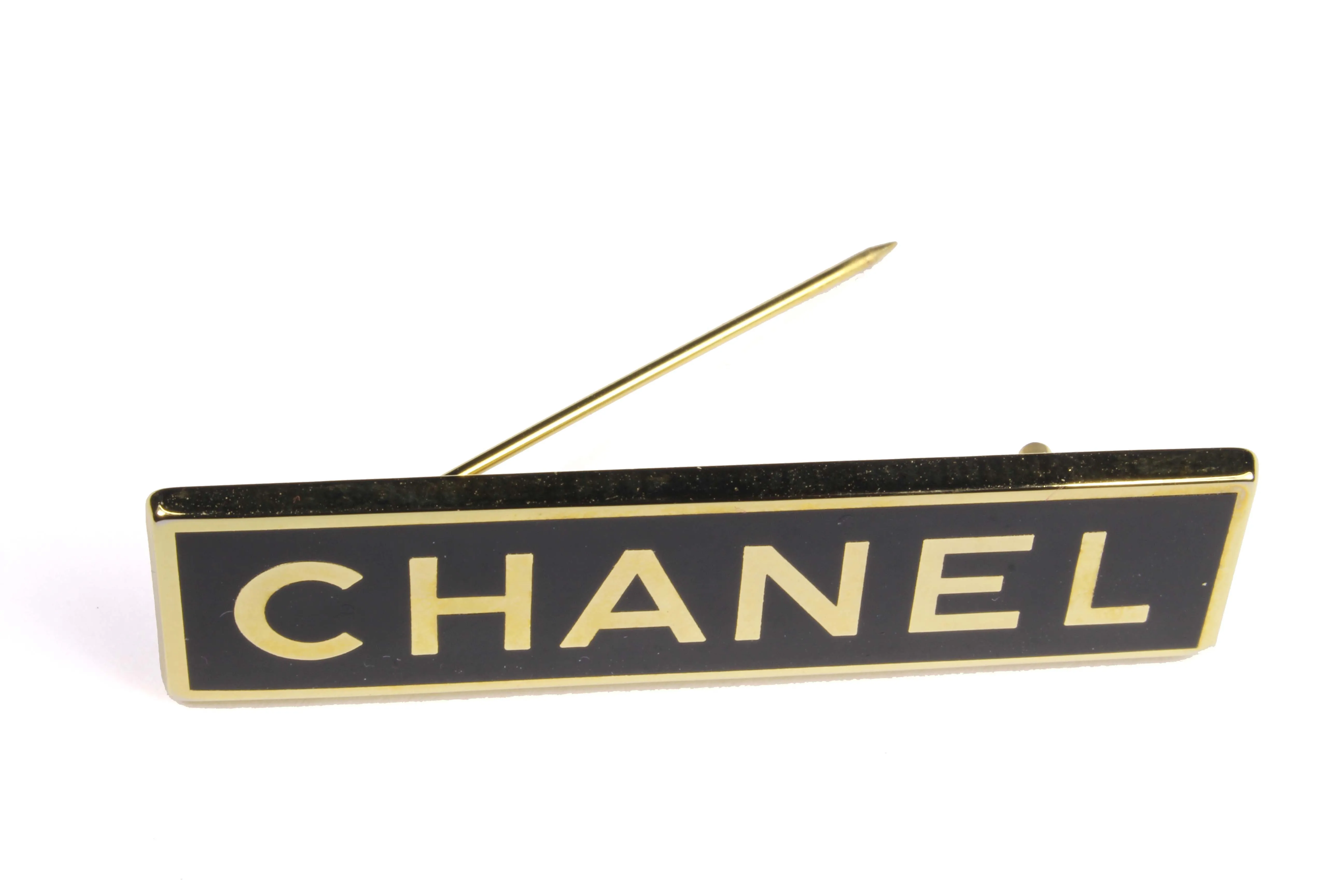 CHANEL rectangular logo brooch