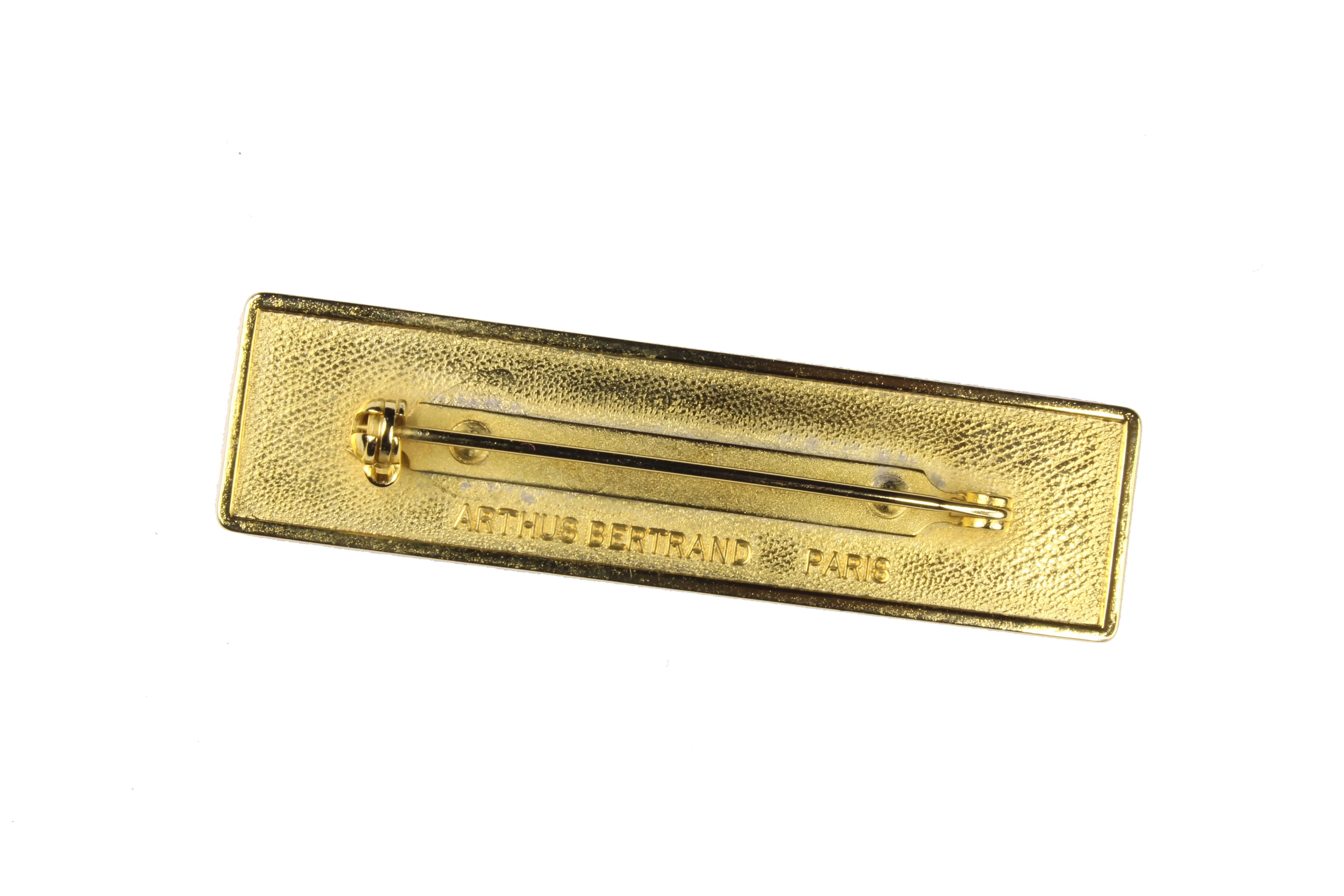 CHANEL rectangular logo brooch